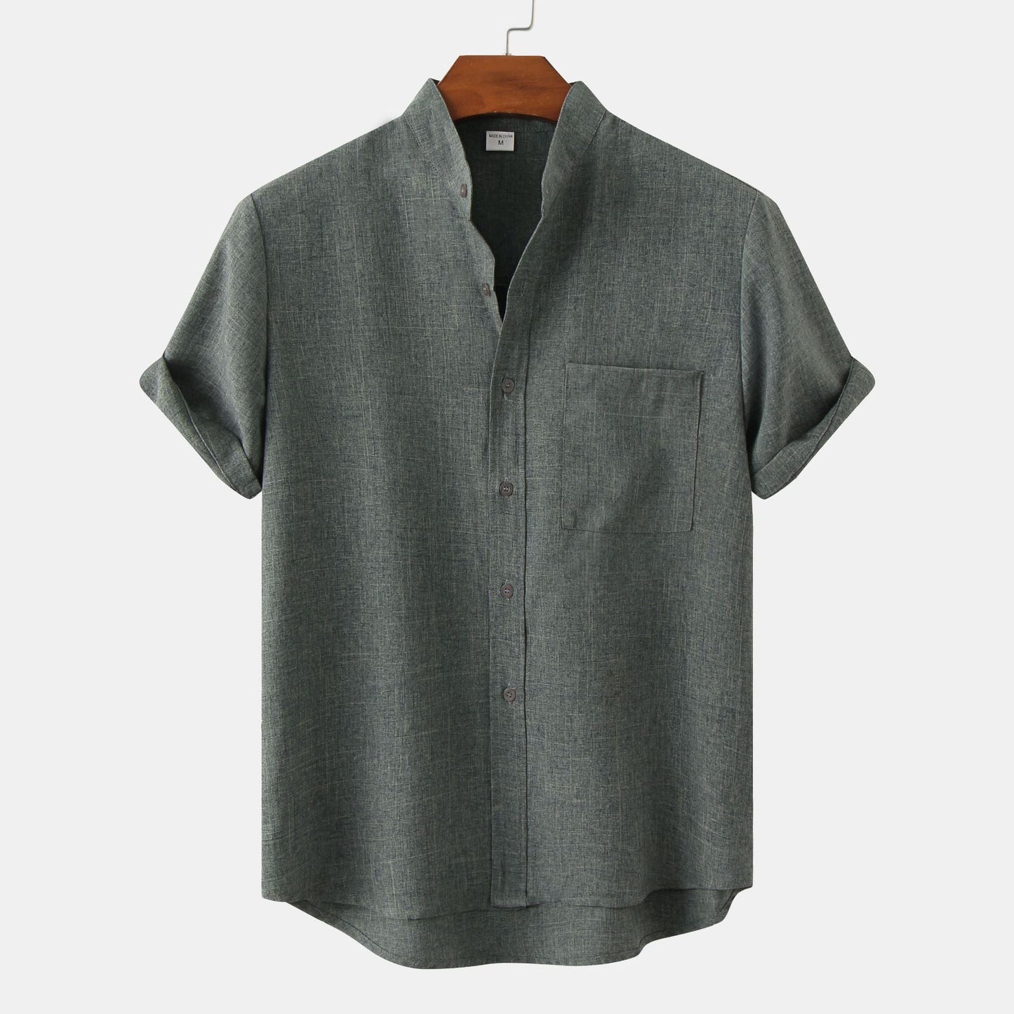 Camicia in cotone unita con bottoni.