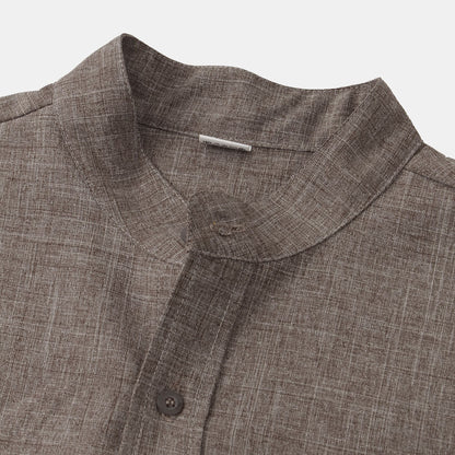 Camicia in cotone unita con bottoni.
