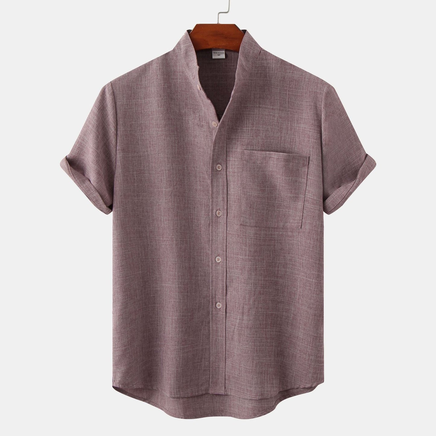 Camicia in cotone unita con bottoni.