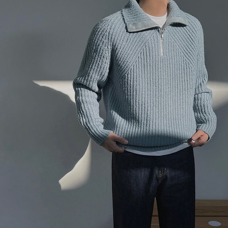 Pullover Azure a quarti di zip.