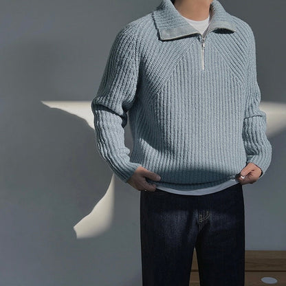 Pullover Azure a quarti di zip.